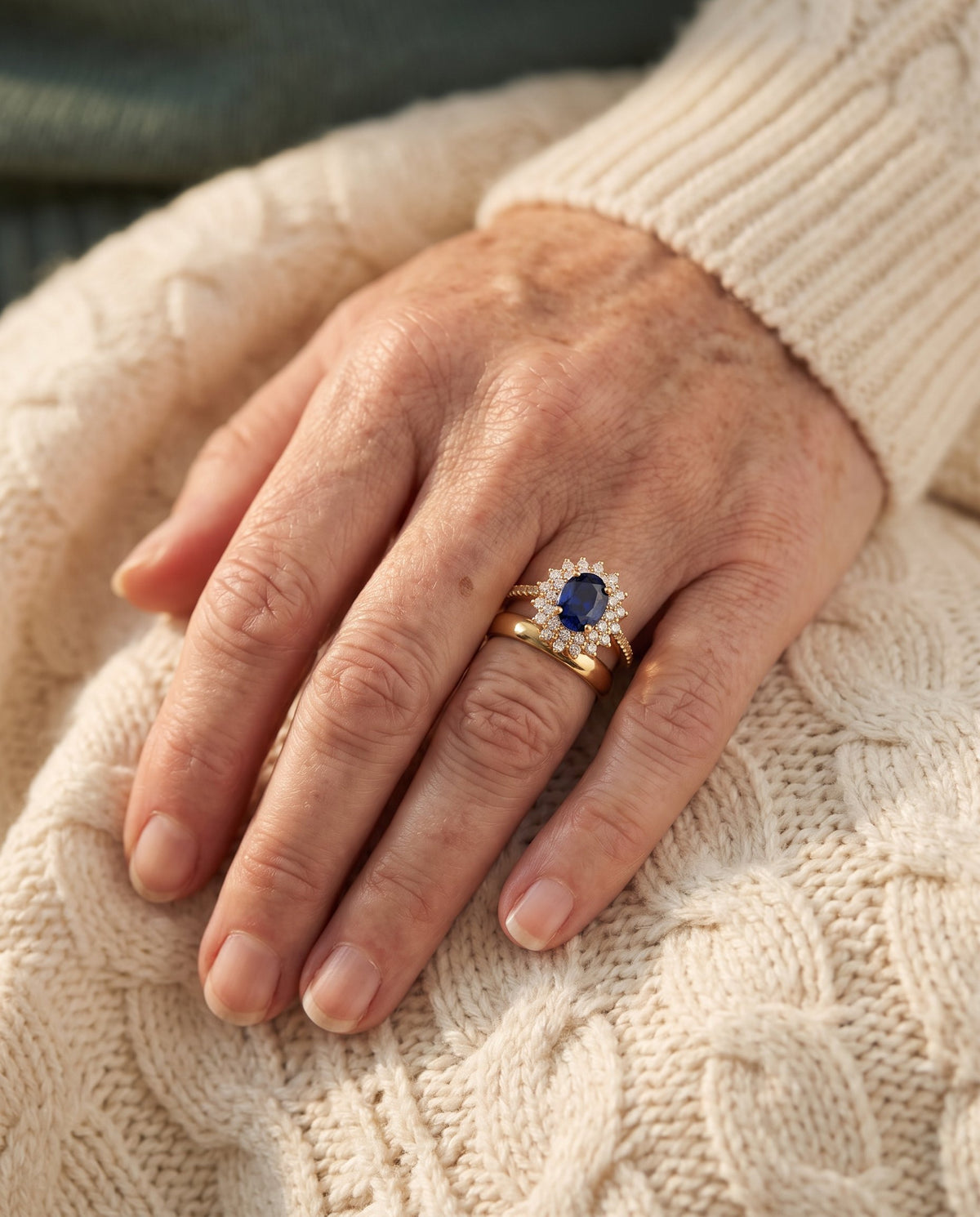 Royal Sapphire Halo Ring worn on the hand